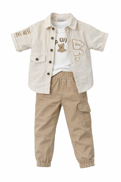 Children's outfit with beige shirt, white t-shirt with teddy bear design, and beige pants on a white background