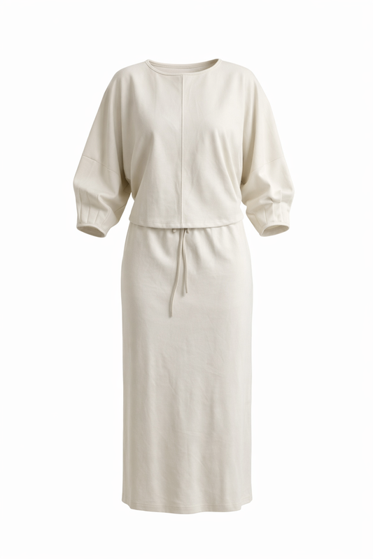 Beige outfit with top and skirt on a white background