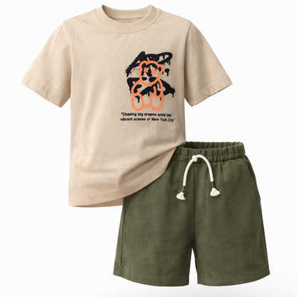 Beige t-shirt with graphic design and green shorts on a white background
