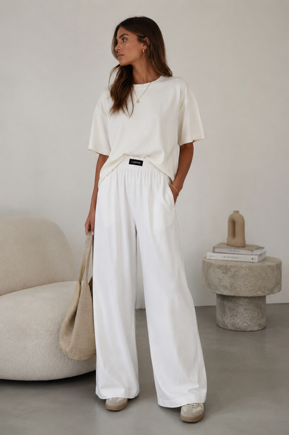 Ilgos plačios laisvalaikio kelnės aukštoms, baltos