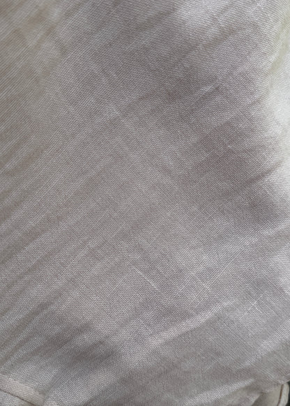 Close-up of gray fabric with a subtle pattern