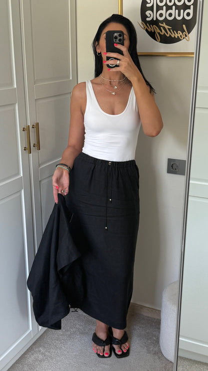 Lininis kostiumas su sijonu