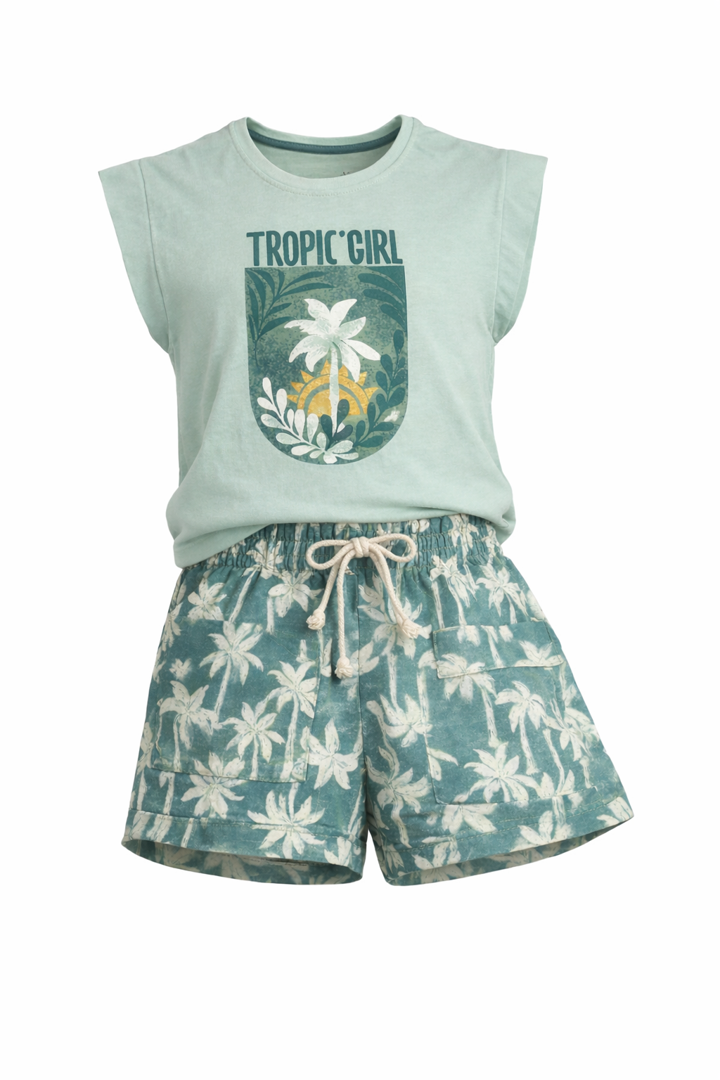 Light green sleeveless top with 'Tropic Girl' text and floral design, paired with floral shorts on a white background.