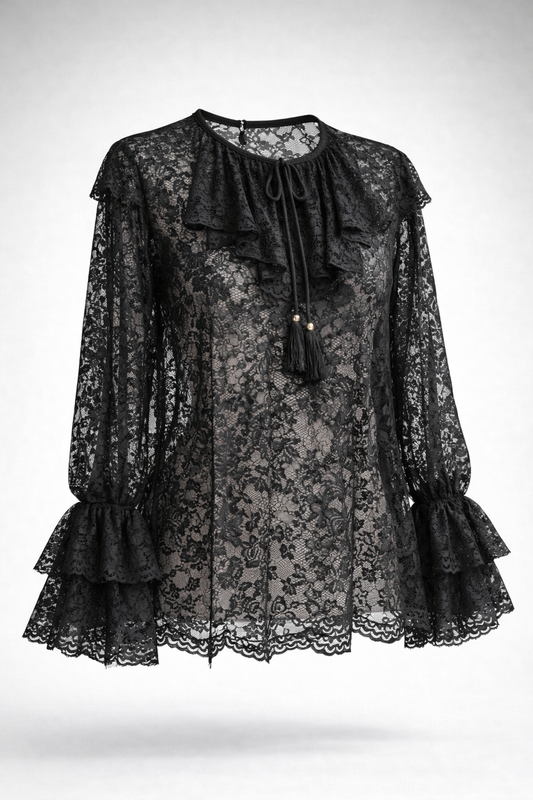 Black lace dress with ruffled details on a white background