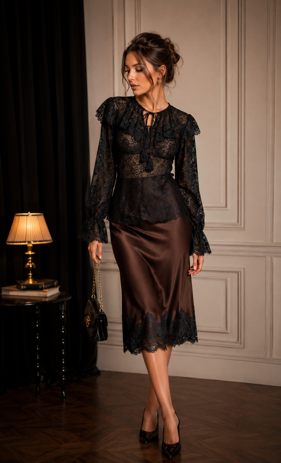Woman wearing a black lace top and brown skirt in an elegant room.