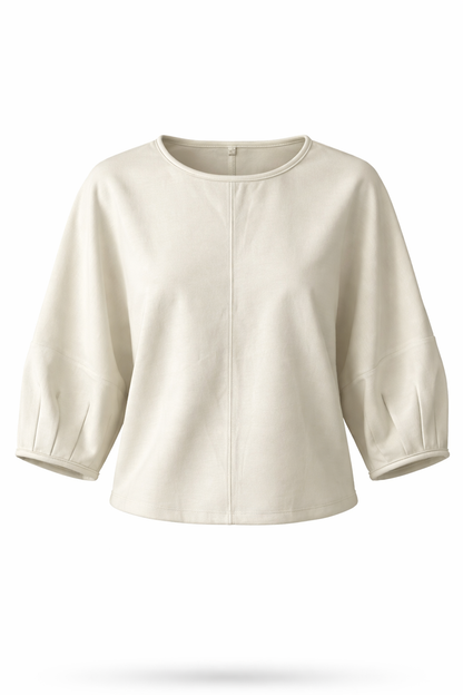 Beige blouse with short sleeves on a white background