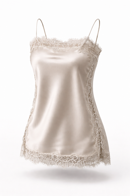 Silky satin camisole with lace trim on a white background
