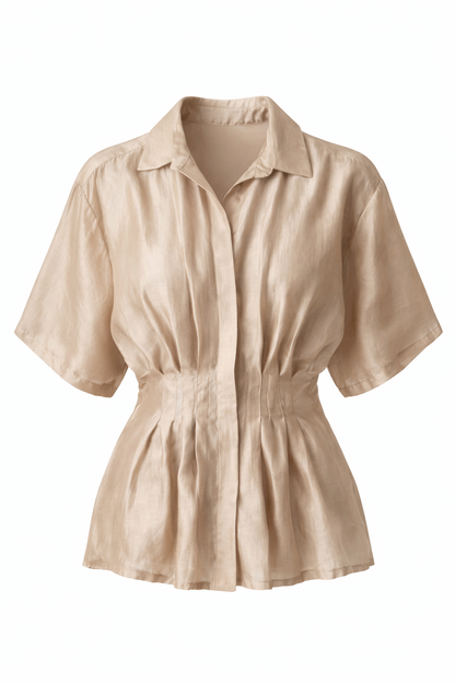 Beige shirt with a belt on a white background