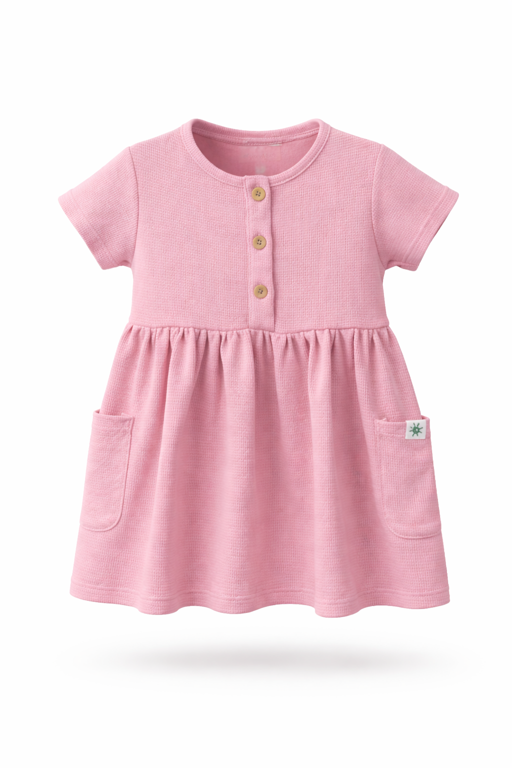 Pink dress with short sleeves and buttons on a white background