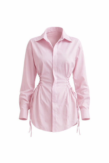 Pink shirt dress on a white background